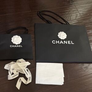 CHANEL Black Bags with White Logo and Ribbon